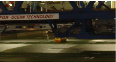 Fig. 14 The Terry Fox as it starts to proceed down the tank in the initial ice sheet   Test 