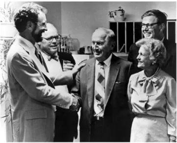 Fig. 1 Founding WCP director Dr. John Parrish (left), meets with phi- phi-lanthropists Arthur (center) and Gullan Wellman (front right) in 1982.