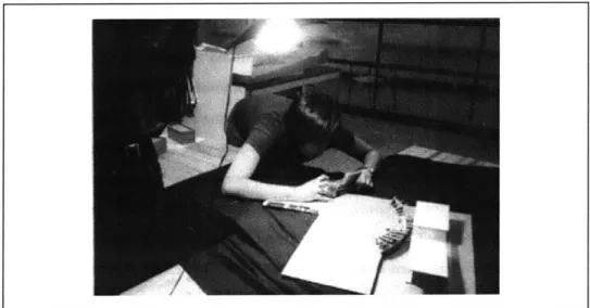 Figure  13:  Student  photographing  the  end  products  of her  design  process  for  her portfolio.