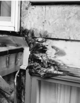 Figure 4. Flashing is in place, but is crushed between the wall and the ledger board,  resulting in little potential for water drainage on its face  (Project A) 