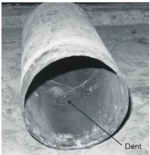 Figure 12.  Elongated corrosion pits caused by scratching pipe.