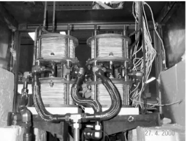 Figure 1. Four fuel cell stacks connected to a common  manifold. (From Global Thermoelectric Inc., with 