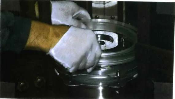 Figure 2.9.1  Photograph of electrodes  and glass insulators inside accelerating  column.