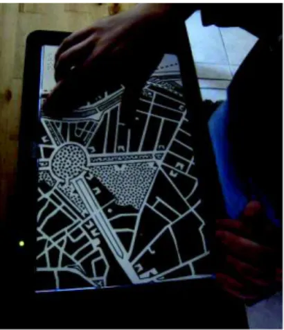 Figure 2. Touch the map! allows blind users to interact with a  tactile map and retrieve names, distances and details using  gestural interaction technique