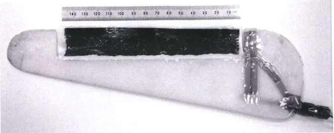 Fig.  3.  A 240  nmilong  foil with  trailing edge  at top. The black  rectangle is a 150 mm long,  30 mm  wide active  section that bends  under applied  potential, resulting in  a change  in  foil  camber.