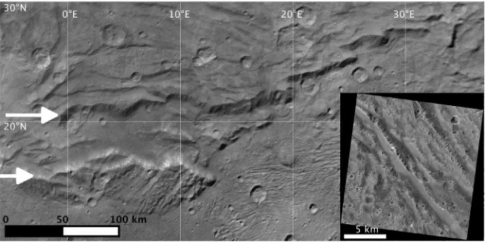 Fig. 6. Serenity Chasma. White arrows point to the north and south rims of Serenity Chasma on this mosaic of several LORRI images (primary image is LOR_0299175682,  deconvolved  to bring  out features)
