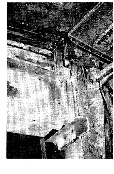 Fig.  13  (Left)  Partial collapse  of  another girder  again  showing failure of  the welded  connection