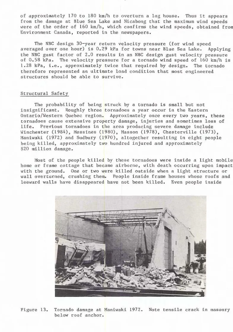 Figure 13.  Tornado damage  at  Maniwaki 1972.  Note  t e n s i l e ' c r a c k   in masonry  below roof anchor