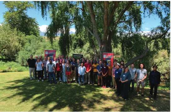 Figure 3. Workshop attendees benefitting from the shade of an alien Eucalyptus sp. on a transformed lawn