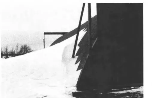 FIG. 18.  View of west (windward) side of same arch (Fig.  16) looking north.  Maximum snow depth at the edge of the arch  was about  1.8  m  (6 ft)