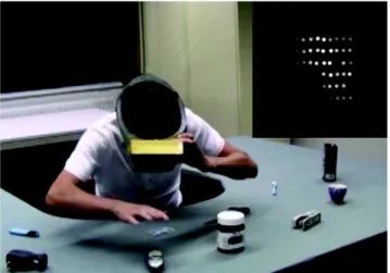 Fig. 4. :  Expérience  de  simulation  de  neuroprothèse  visuelle.  Le  casque  de  réalité  virtuelle  affiche  la  scène  visuelle  telle  qu'elle  serait  perçue  par  une  personne  non-voyante  implantée  avec  une  neuroprothèse  visuelle  (image  e