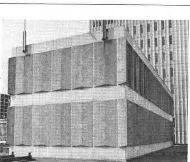 Figure  1 shows the penthouse.  The panels  are  12 by  5 ft (3.6 by  1.5 m)  on the bottom  row  and  14  by  5  ft  (4.3  by  1.5 m)  on  the  top  row