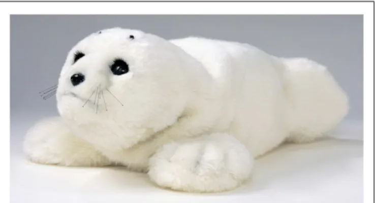 FIGURE 1 | Baby Seal Robot, PARO (Shibata, 2012).