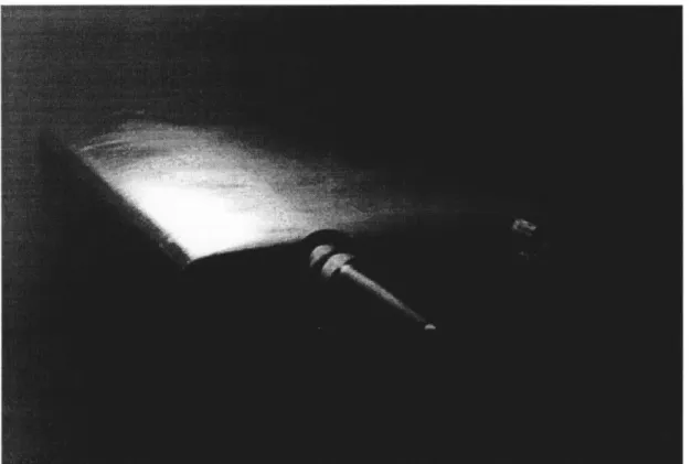 Figure  2-3:  Photographs  of  the  hydrofoil  in  the  water  tunnel  testing  section