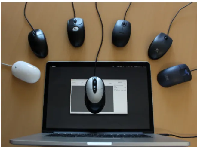 Figure 1: Sample setup used, with a Logitech MX310 mouse positioned on a horizontally-oriented laptop display