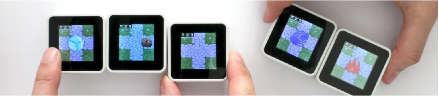 Figure 1. Fat and Furious is a collaborative tangible video game running on Sifteo Cubes.