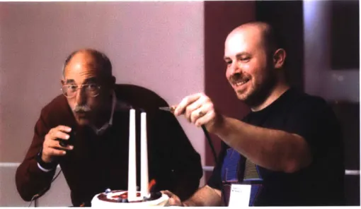 Figure  14  - Andy  Lippman  blowing  out  the  candles over  IP