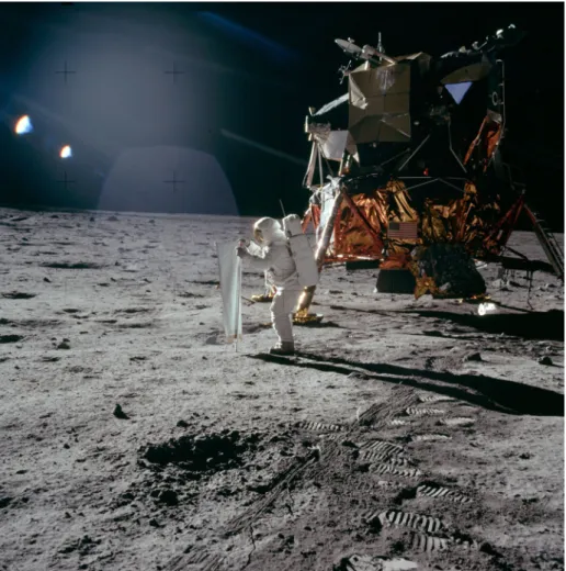 Fig. 9 Astronaut Buzz Aldrin deploying the Solar-Wind Experiment about 5 meters north-northwest of the Apollo 11 lunar module