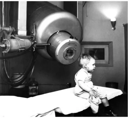 Figure 2-1: The first patient treated with a medical linear accelerator was a two-year- two-year-old boy with an ocular tumor [1].