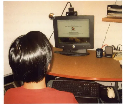 Figure  2-10:  Experimental  setup.  A  stereo  camera  is  placed  on  top  of the  screen  to track  the  head  position  and orientation.