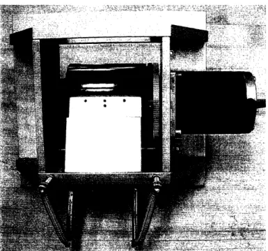 Figure 9: Photo of crucible, stepper motor,  and peeling mechanism.