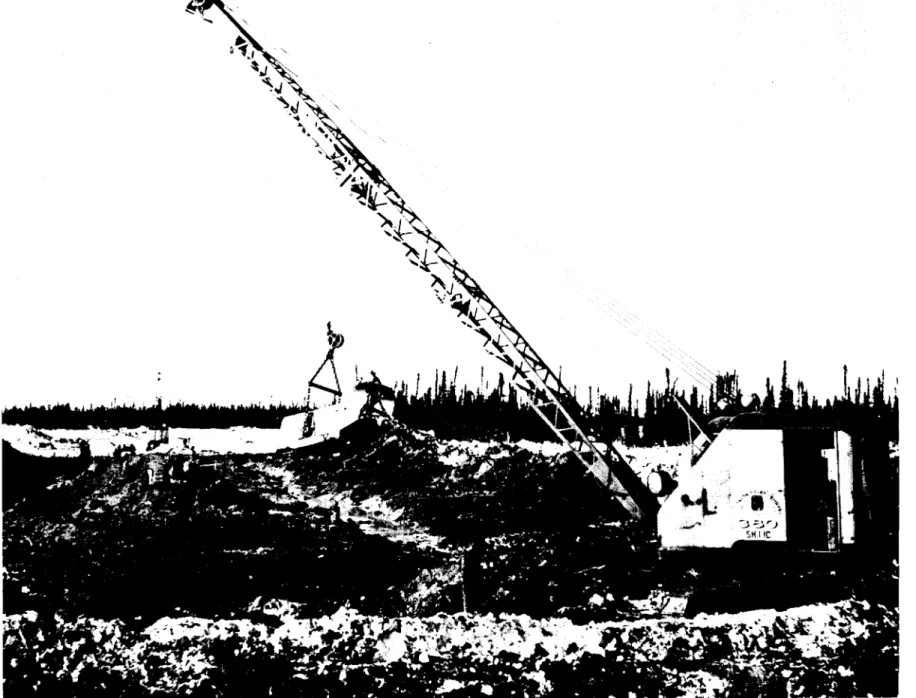 FIG. 6 DRAGLINES WASTING ORGANIC MATERIAL AND CONSTRUCTING TRAFFICABLE ROAD ON CENTRELINE