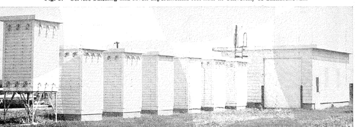 Fig.  1 .   Sel-vice building  and  s e v e n  e s p e r i l n e n t a l  test  huts  at  University  of  Saskatchewan