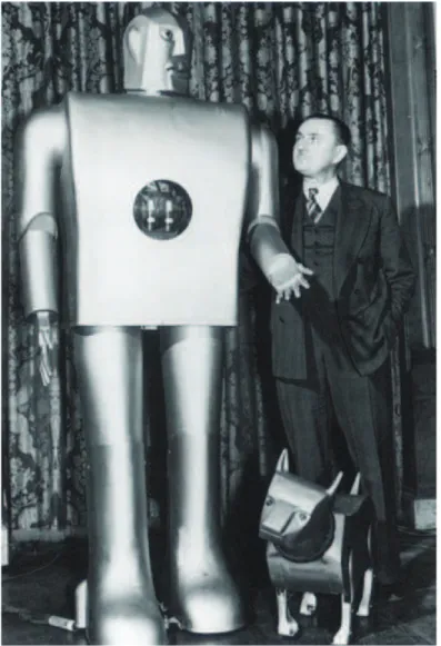 Figure 1.12: Joseph Barnett and Elektro, with Sparko a robot dog (From history- history-computer.com)