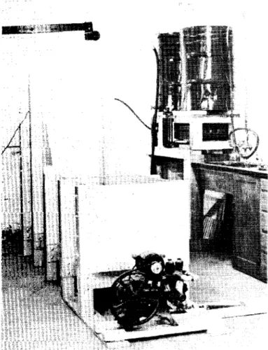 Figure 3 View of tank from discharge end. Reservoir, top right
