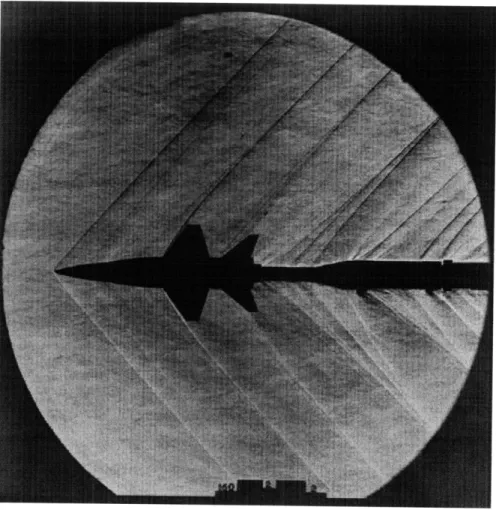 Figure  4-2:  Oblique  shock  waves  in  a  NASA  Langley  supersonic  wind  tunnel.  The line  represents  high-entropy  wave fronts  in a  series  of ripple-like shock  waves
