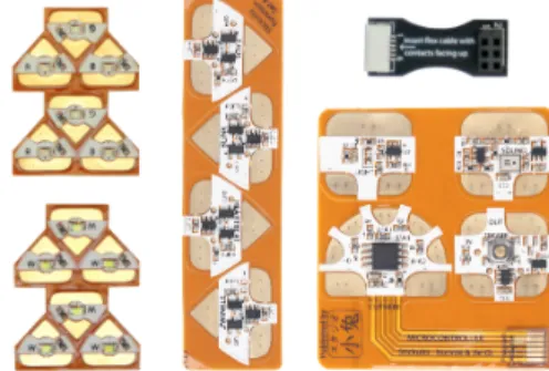 Figure 2. Left to right: LED stickers, Effect stickers, Sensor  and Microcontroller stickers and programming connector