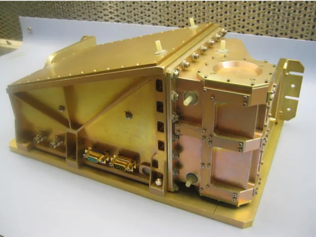 Figure 2.  CRaTER flight model: telescope assembly is the rightmost portion  while the signal processing section and spacecraft interface is in the slanted  enclosure to the left