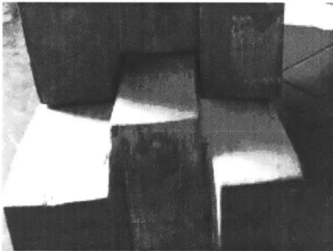 Figure  3-7:  Interlocking Makiga  Brick.  This  interlocking  brick  uses  an  offset central  element  to  interlock  with  neighboring  bricks  on  four  sides[3.