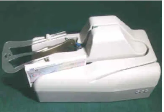 Fig. 1. Cheque scanner (courtesy SEAC-BANCHE). Up to 50 cheques (or  index cards) are loaded into the font hopper, and are then fed one-by-one  past twin vertically mounted CCDs (so both sides of the document are  scanned simultaneously)