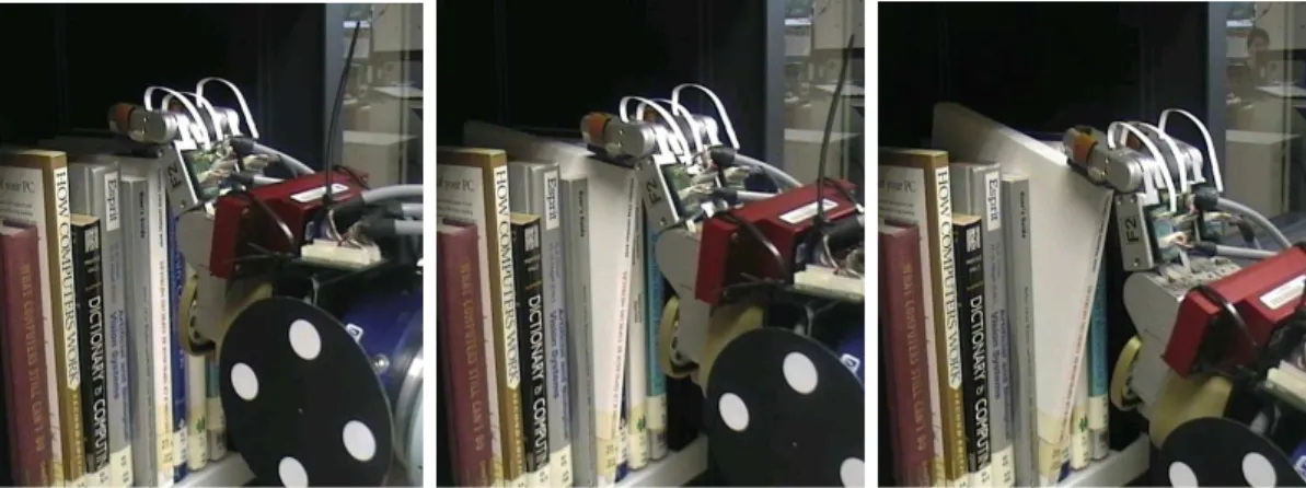 Fig. 3. The robot grasping the book by means of force and tactile-based continuous estimation of hand-to-object relative pose.