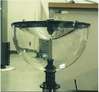Fig. 2.17: Capteur catadioptrique HyperOmni (http ://w3.sys.es.osaka- ://w3.sys.es.osaka-u.ac.jp/projects/robot/index-e.html) : Miroir hyperbolique combin´e avec une cam´era perspective.