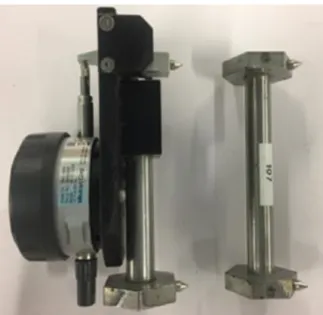 Figure 2.24: The extensometer and calibration section used to measure the variation in length 