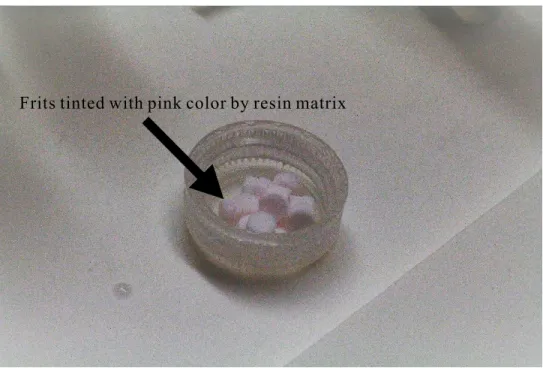 Figure 2.5 Example of resin matrix tinting eluting out and tinting the frits. 