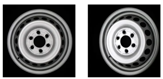 Figure 3.7: Two images of the same wheel, one acquired with camera n ◦ 1 (a) while the other with one of the side cameras (b).