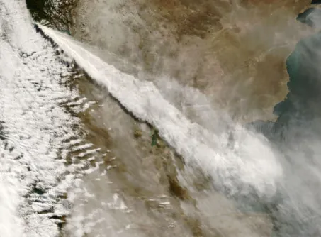 Figure 1.1.2: Ash cloud from the 2008 eruption of Chaitén volcano, Chile, stretching across Patagonia from the Pacific to the Atlantic Ocean