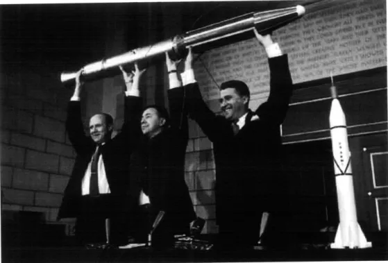 Figure  2-3:  From  left  to  right:  William  Pickering,  James  Van  Allen,  and  Wernher  von  Braun holding  a model  of Explorer I  at a press conference,  February  1,  1958.