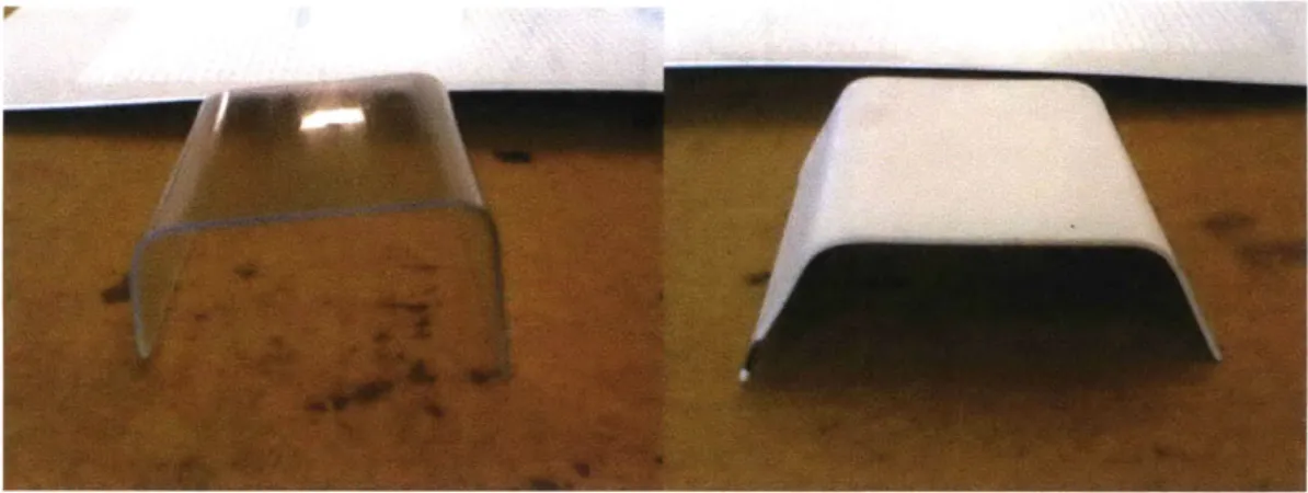 Figure 9:  PETG (clear)  held its  shape well  when used  as the  bottom pre-cut  layer in the  dual-layer vacuum-forming  process,  however, polystyrene  (white)  did not.