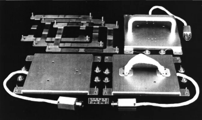 Figure  1.1: The  photographs  shows the  DLS sensors:  a touchpad, a foot restraint,  and a handhold  as well frames  to anchor  the sensors to the floor  or walls of the orbiter