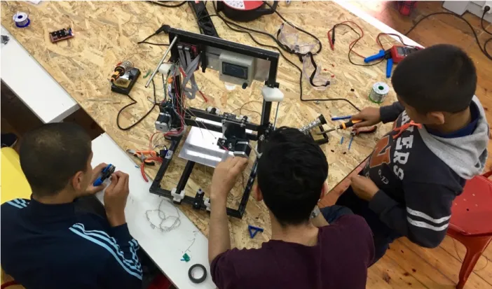 Figure  5:  3D-Printer  built  from  discarded  computer  parts  during  Digital  Design  and  Fabrication  Workshop  in  2018