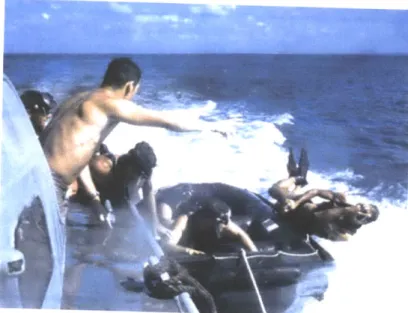 Figure 2.8:  Navy  SEALS  performing a  high-speed  boat cast