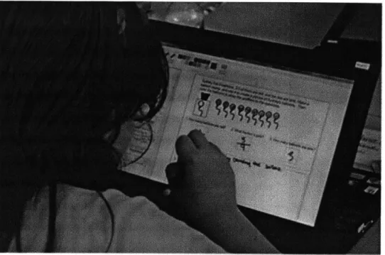 Figure  2-1:  A  fourth  grade  student  working  on  a  math  exercise  in  her  CLP  math notebook