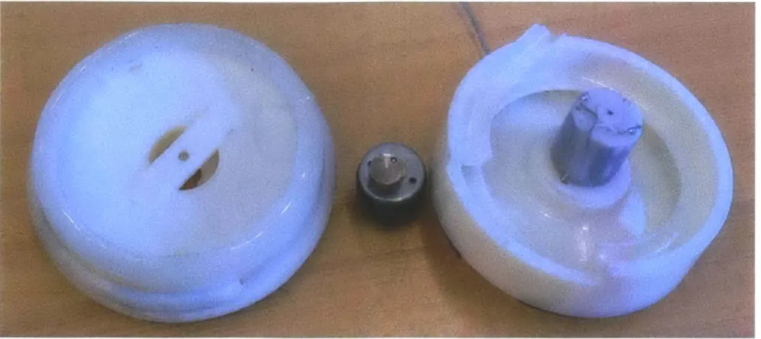 Figure 3-2:  3D  printed vibratory  feeder with  attached  DC motor  with offset  counter  weight and  silicon base  layer to  control the  vibration frequency