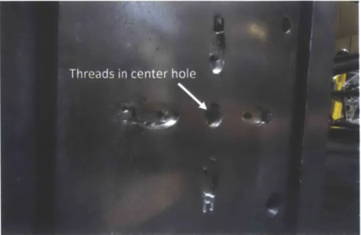 Figure  3-8:  The  core  side  with  threads  in  the  center  hole.  Photograph  by  author.