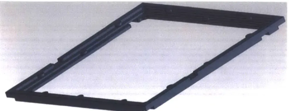 Figure  2-10:  To  support  the  use  of  metal  extractor  grids,  a  silicon  grid  frame  was designed  to  fit  and  align  to  the  thruster  frame