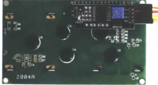 Figure  7: The  back of the lcd  display with the  microcontroller board shown  on the top right corner.